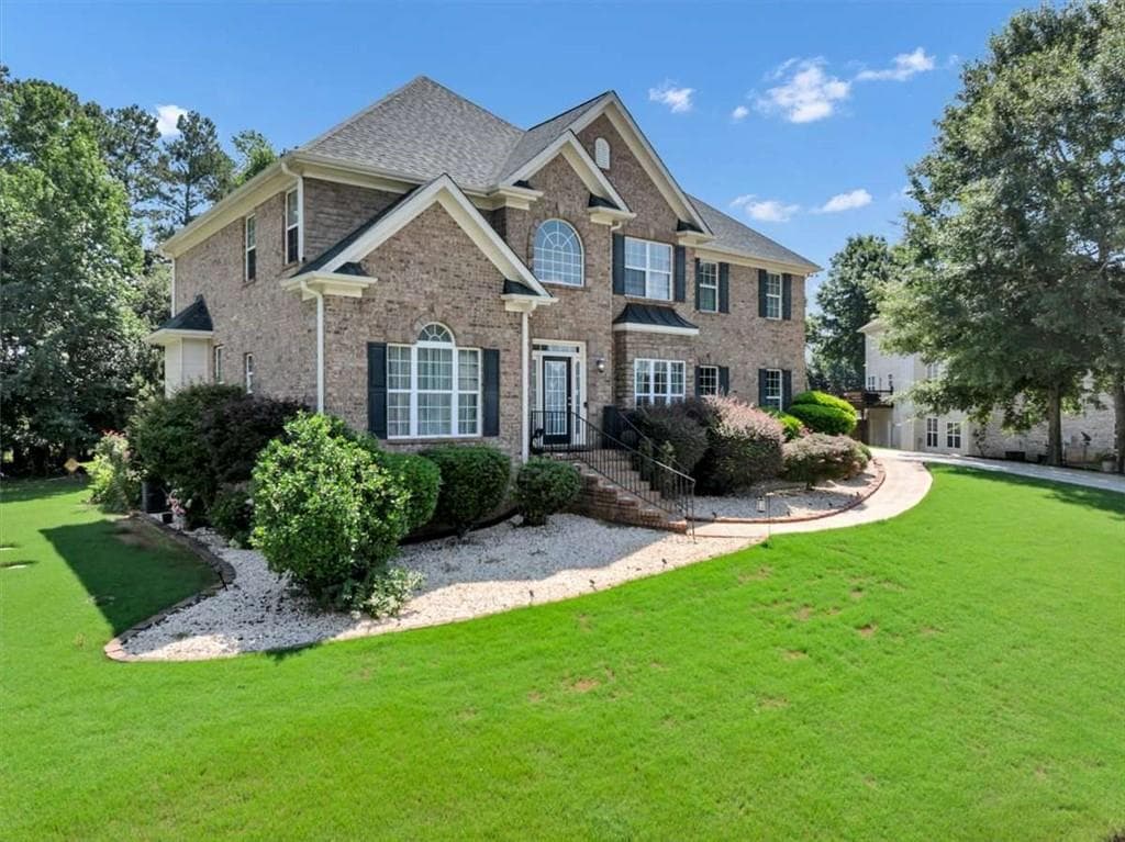 6 bedroom, 5 bathroom, 3,630 sq ft single family residence for sale at 2123 SW Crest Wood Drive, Conyers, GA 30094 — photo 2