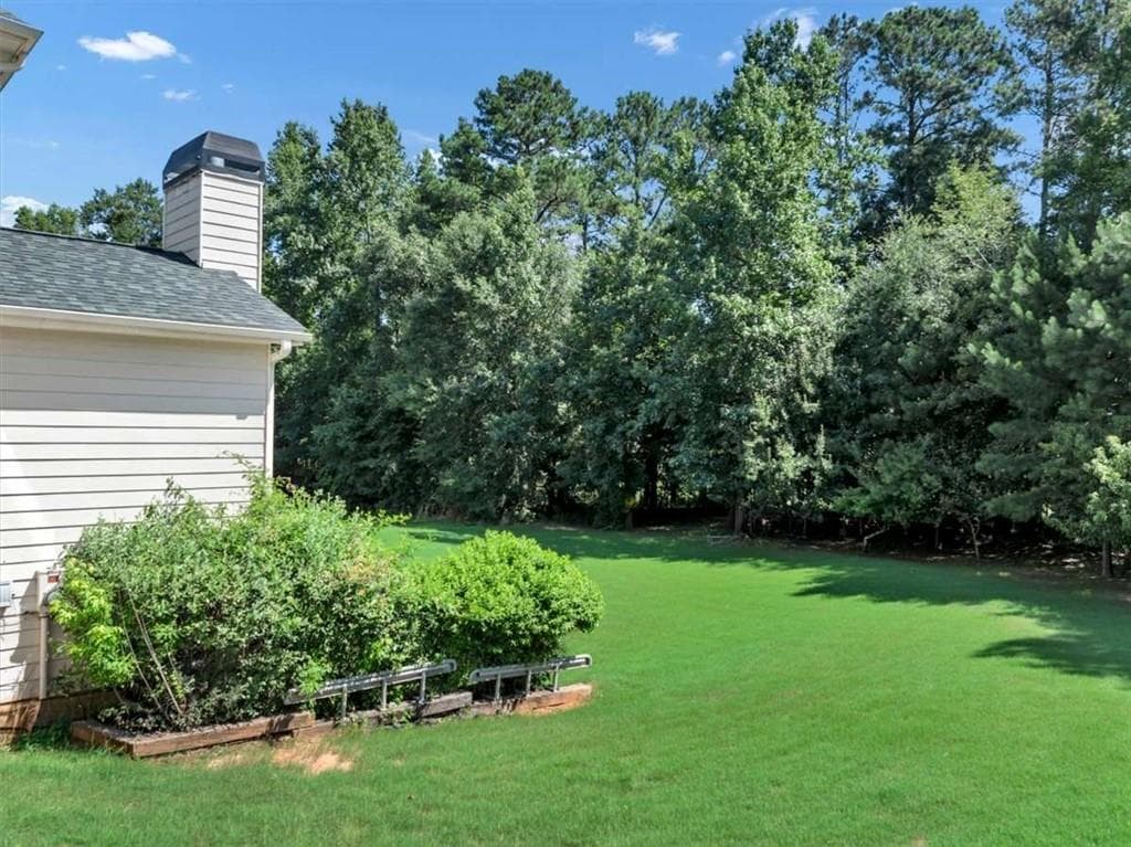 6 bedroom, 5 bathroom, 3,630 sq ft single family residence for sale at 2123 SW Crest Wood Drive, Conyers, GA 30094 — photo 7