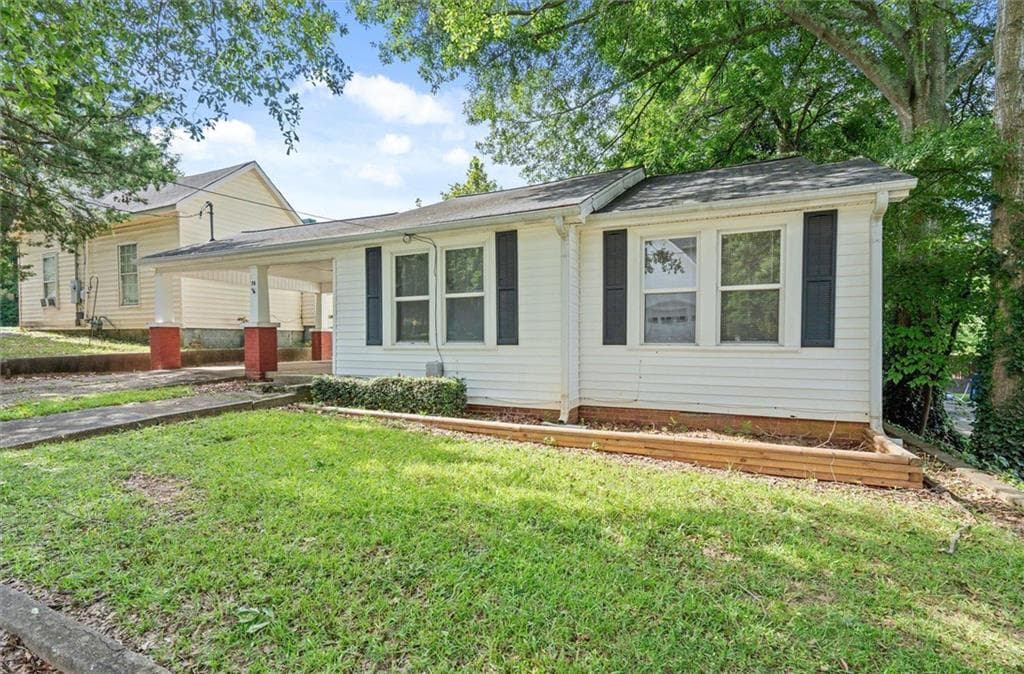 2 bedroom, 1 bathroom, 970 sq ft single family residence for sale at 76 W Mill Street, Tallapoosa, GA 30176 — photo 2