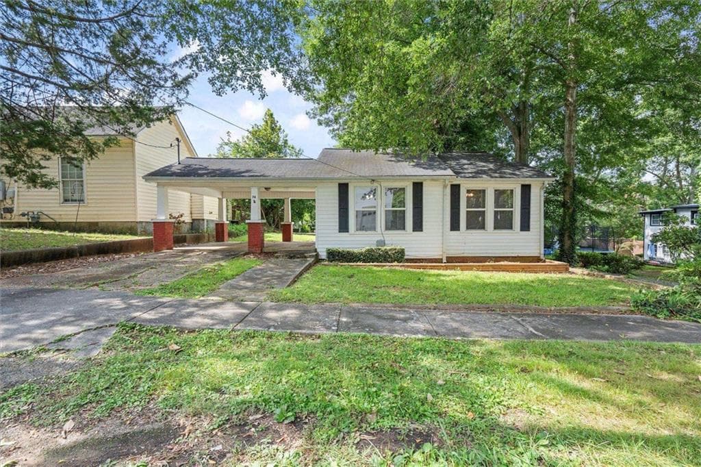 2 bedroom, 1 bathroom, 970 sq ft single family residence for sale at 76 W Mill Street, Tallapoosa, GA 30176 — photo 3