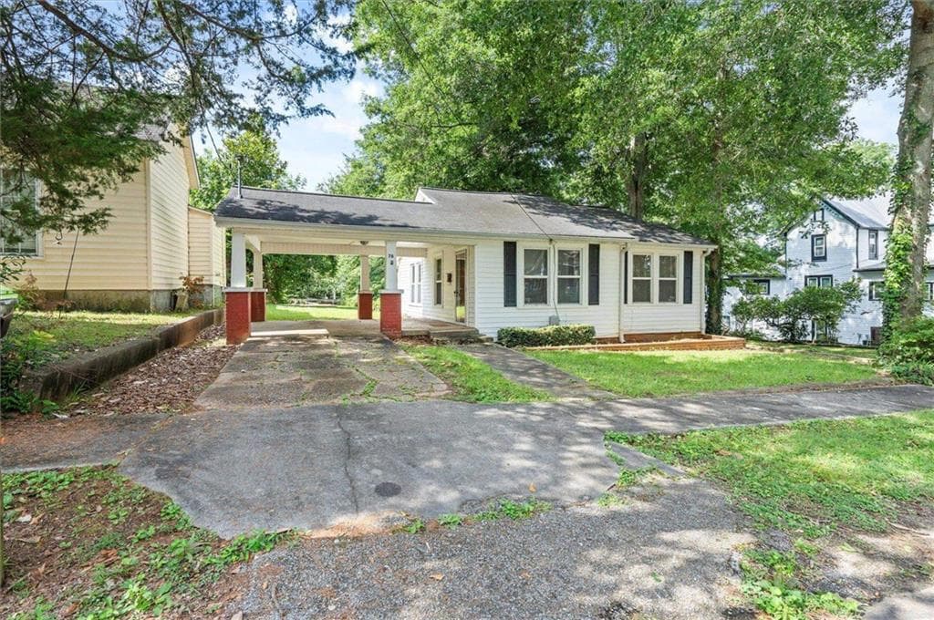 2 bedroom, 1 bathroom, 970 sq ft single family residence for sale at 76 W Mill Street, Tallapoosa, GA 30176 — photo 4