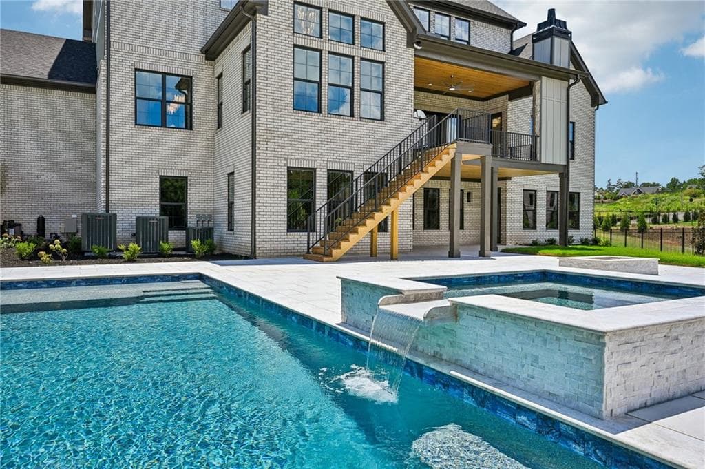 5 bedroom, 7 bathroom, 10,351 sq ft single family residence for sale at 6119 Bethany View Trl, Buford, GA 30518 — photo 3