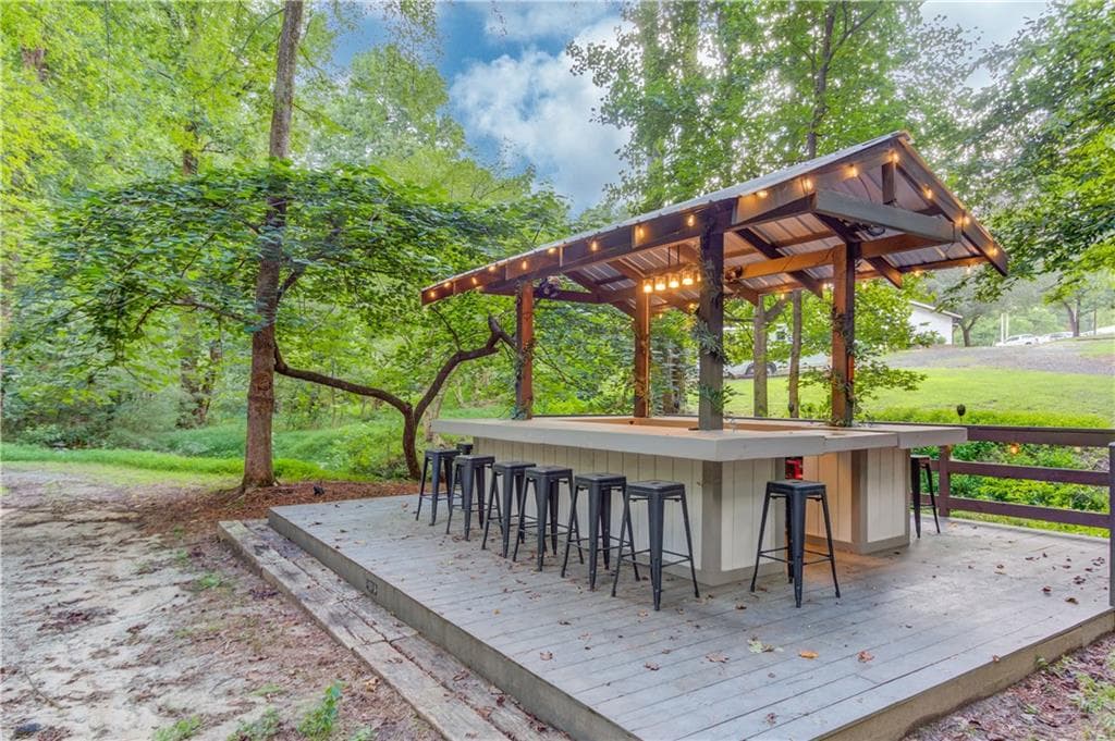4 bedroom, 4 bathroom, 3,160 sq ft single family residence for sale at 8401 Norris Lake Way, Snellville, GA 30039 — photo 4