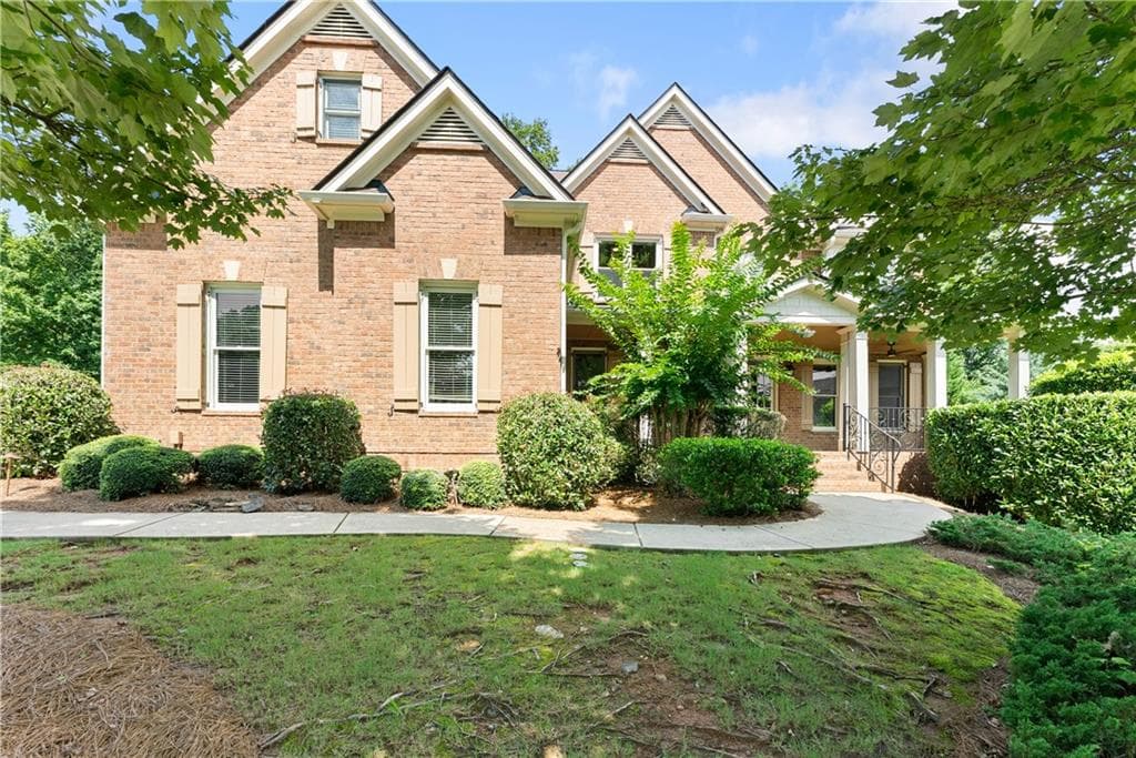 6 bedroom, 5 bathroom, 6,532 sq ft single family residence for sale at 6120 Briarpatch Court, Cumming, GA 30040 — photo 1 of 87