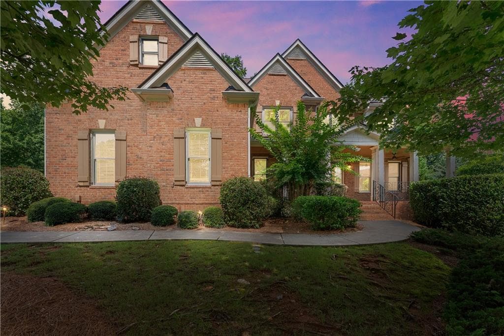 6 bedroom, 5 bathroom, 6,532 sq ft single family residence for sale at 6120 Briarpatch Court, Cumming, GA 30040 — photo 2