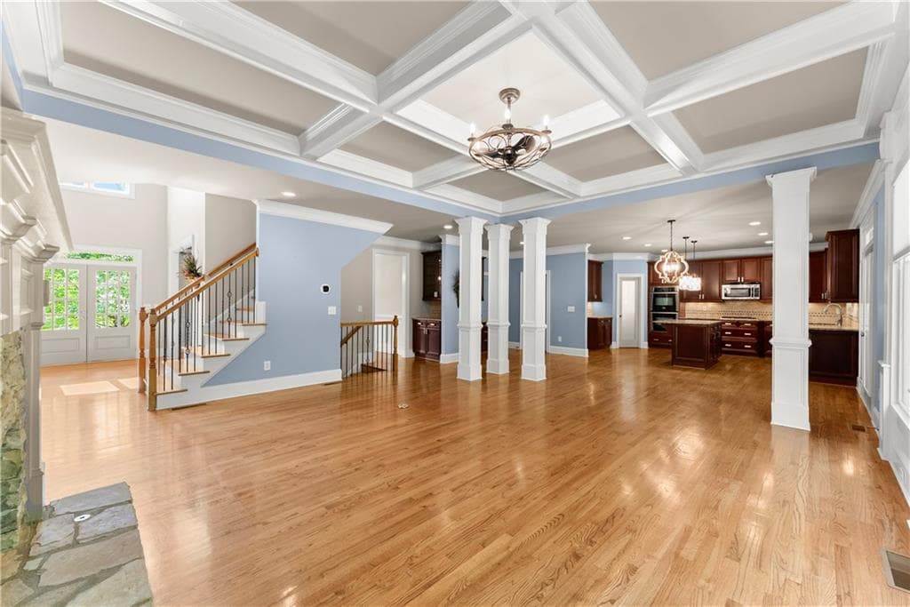 6 bedroom, 5 bathroom, 6,532 sq ft single family residence for sale at 6120 Briarpatch Court, Cumming, GA 30040 — photo 6