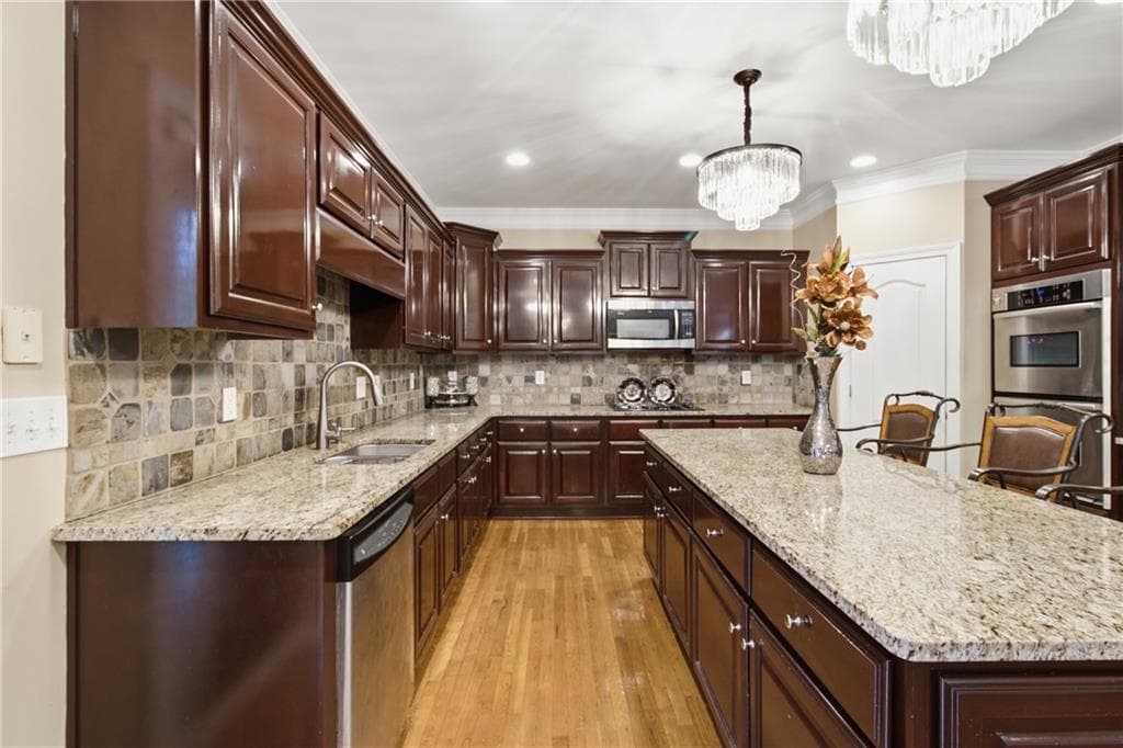 7 bedroom, 6 bathroom, 6,037 sq ft single family residence for sale at 215 Fox Glove Drive, Covington, GA 30016 — photo 3