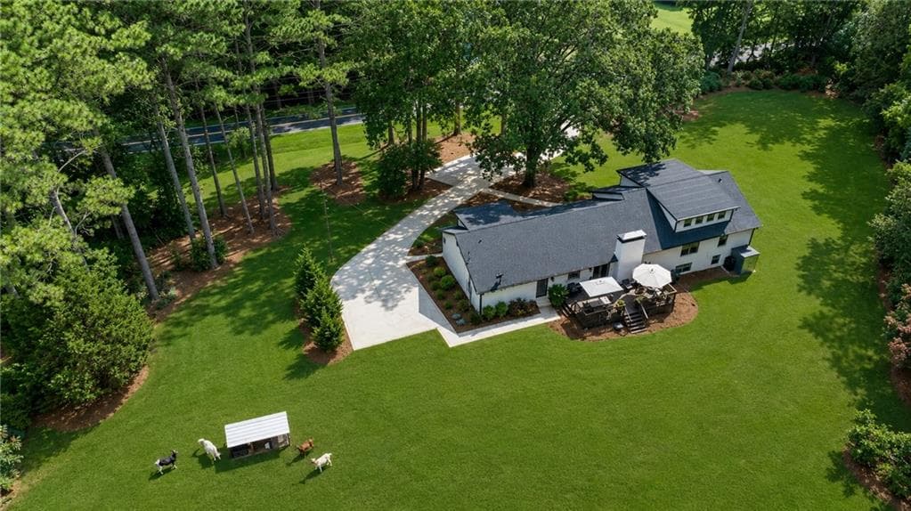 5 bedroom, 4 bathroom, 4,623 sq ft single family residence for sale at 9585 Hutcheson Ferry Road, Chattahoochee Hills, GA 30268 — photo 2