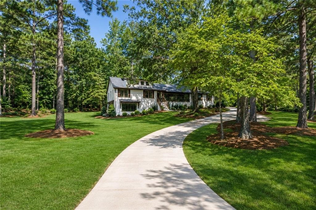 5 bedroom, 4 bathroom, 4,623 sq ft single family residence for sale at 9585 Hutcheson Ferry Road, Chattahoochee Hills, GA 30268 — photo 1 of 60