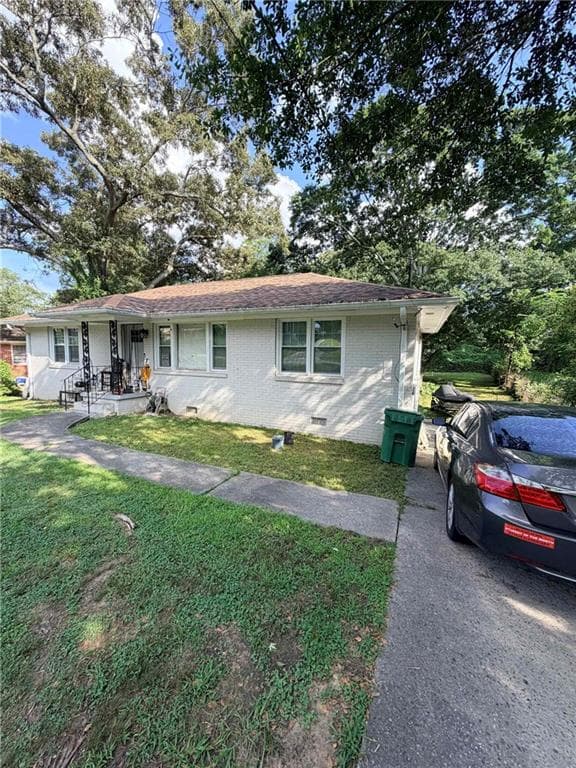 3 bedroom, 1 bathroom, 1,128 sq ft single family residence for sale at 1025 Rocksprings Street, Forest Park, GA 30297 — photo 2