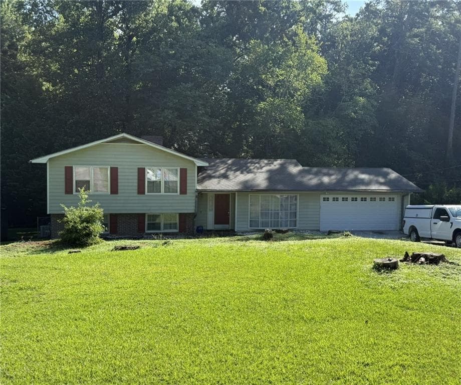 5 bedroom, 3 bathroom, 2,285 sq ft single family residence for sale at 1966 Kensington High Street, Lilburn, GA 30047