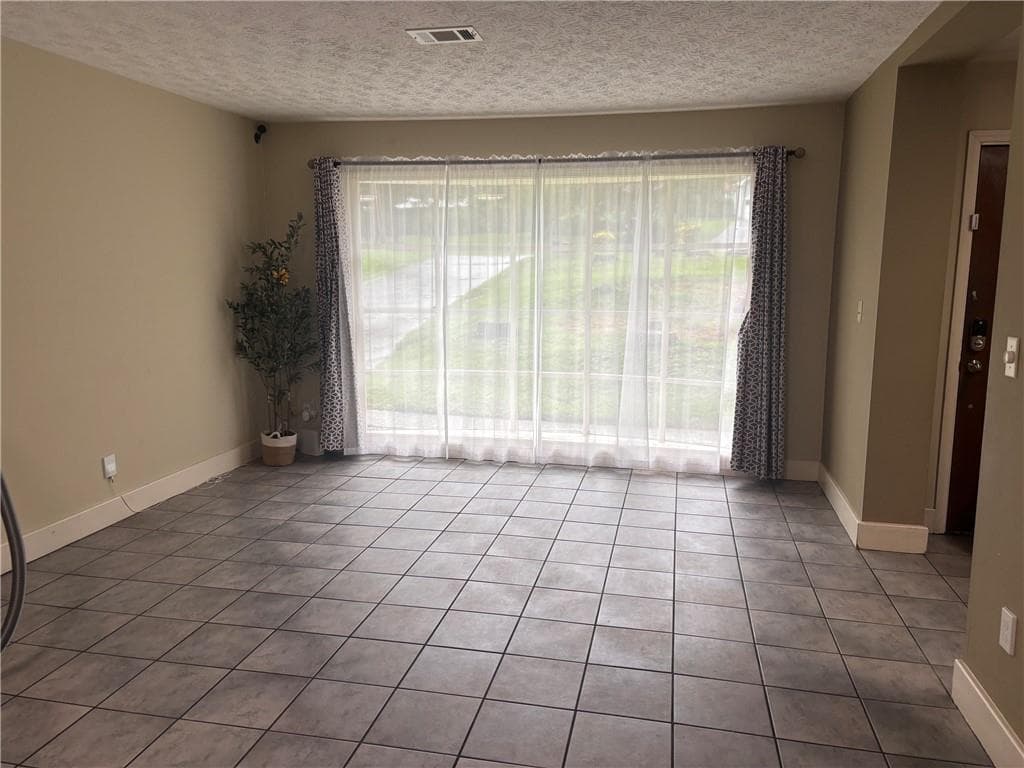 5 bedroom, 3 bathroom, 2,285 sq ft single family residence for sale at 1966 Kensington High Street, Lilburn, GA 30047 — photo 4