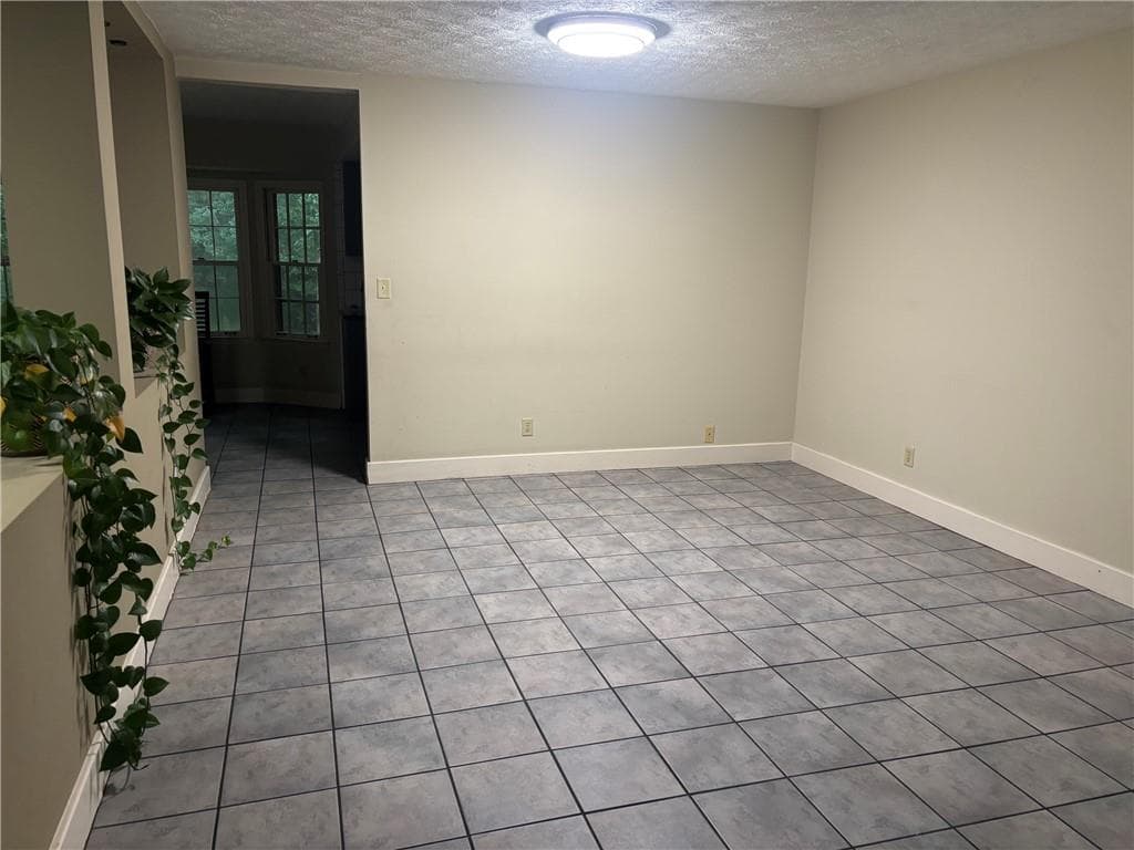5 bedroom, 3 bathroom, 2,285 sq ft single family residence for sale at 1966 Kensington High Street, Lilburn, GA 30047 — photo 5
