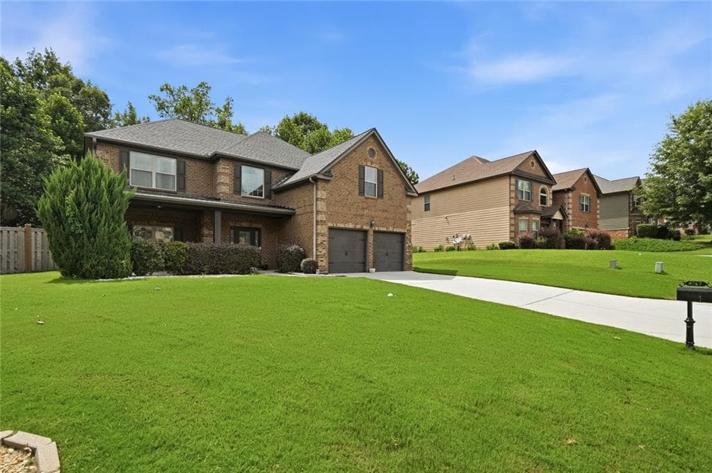 4 bedroom, 3 bathroom, 3,066 sq ft single family residence for sale at 8747 Puett Drive, Douglasville, GA 30135 — photo 2
