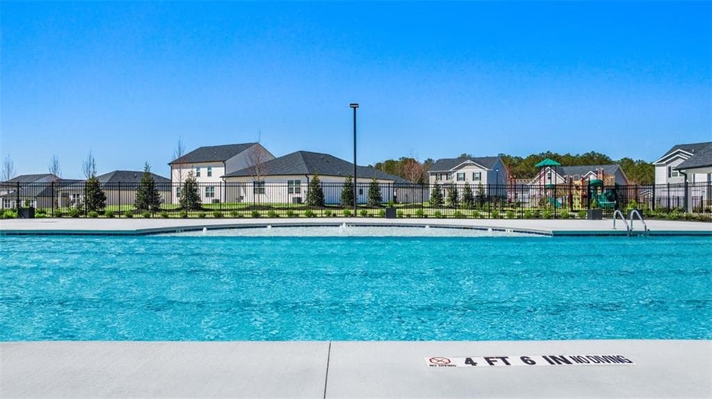4 bedroom, 3 bathroom, 2,175 sq ft single family residence for sale at 8569 Secretariat Drive, Lithonia, GA 30058 — photo 7