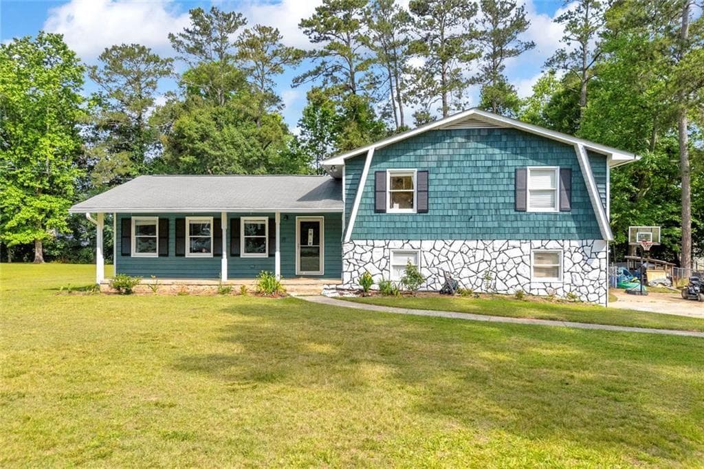 3 bedroom, 2 bathroom, 2,416 sq ft single family residence for sale at 144 Zion Wood Road, Loganville, GA 30052 — photo 1 of 54