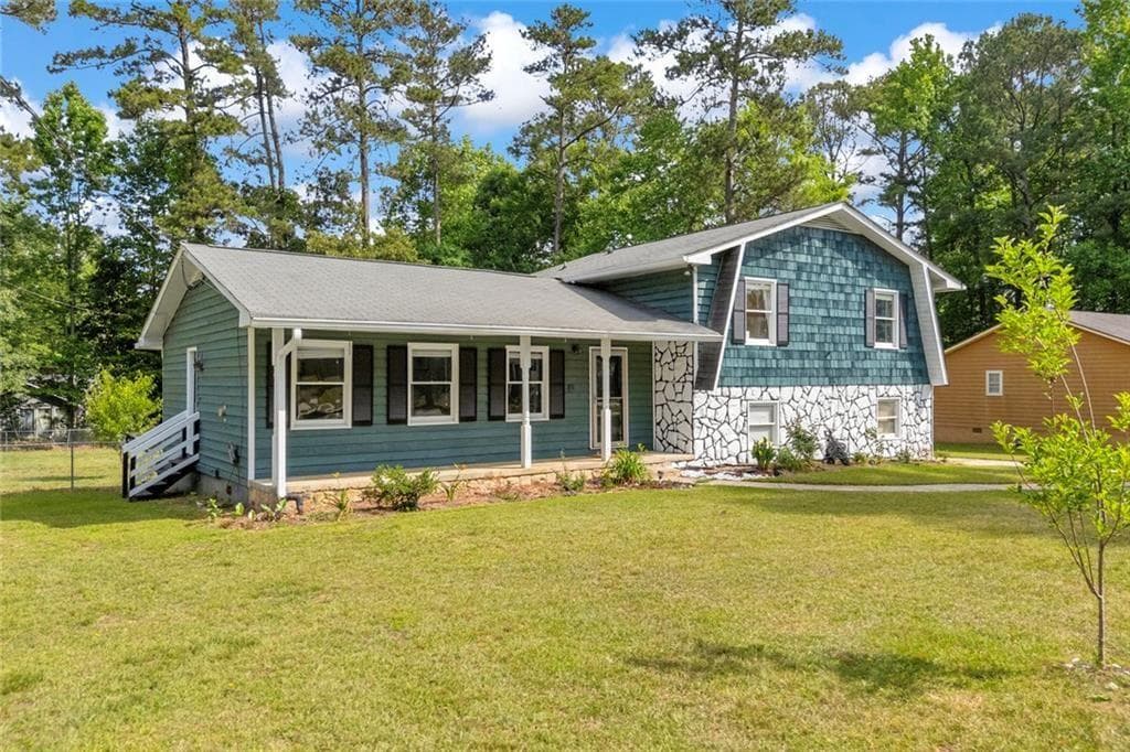 3 bedroom, 2 bathroom, 2,416 sq ft single family residence for sale at 144 Zion Wood Road, Loganville, GA 30052 — photo 2