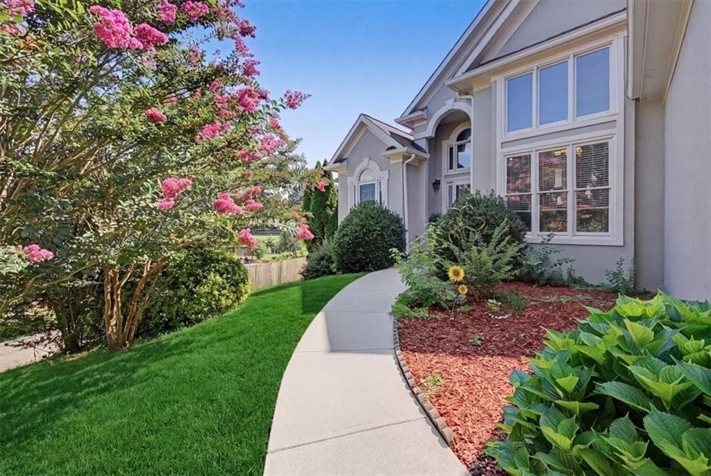 3 bedroom, 2 bathroom, 3,416 sq ft single family residence for sale at 4970 Hyde Court, Cumming, GA 30040 — photo 2