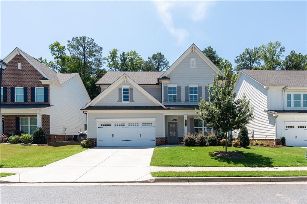 4 bedroom, 4 bathroom, 2,932 sq ft single family residence for sale at 1210 Baynes Creek Drive, Suwanee, GA 30024 — photo 1 of 56