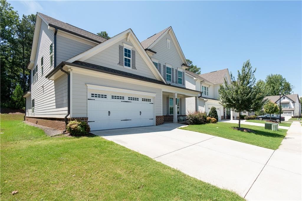 4 bedroom, 4 bathroom, 2,932 sq ft single family residence for sale at 1210 Baynes Creek Drive, Suwanee, GA 30024 — photo 2