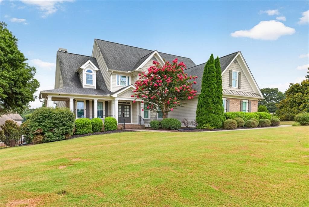 4 bedroom, 4 bathroom, 6,425 sq ft single family residence for sale at 5704 Avalon Commons Way, Clermont, GA 30527 — photo 3