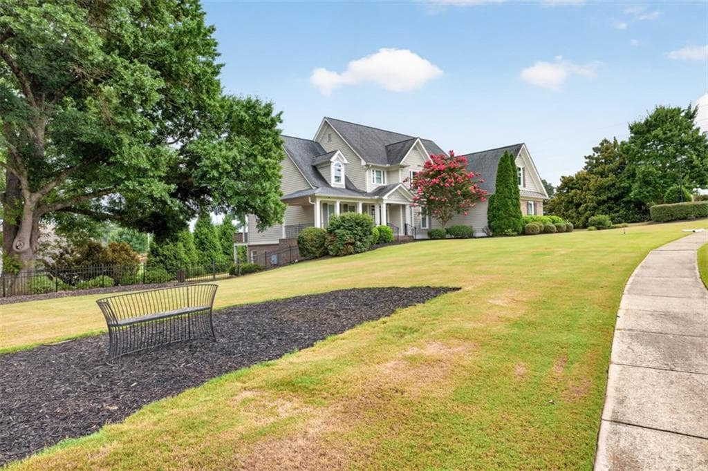 4 bedroom, 4 bathroom, 6,425 sq ft single family residence for sale at 5704 Avalon Commons Way, Clermont, GA 30527 — photo 9