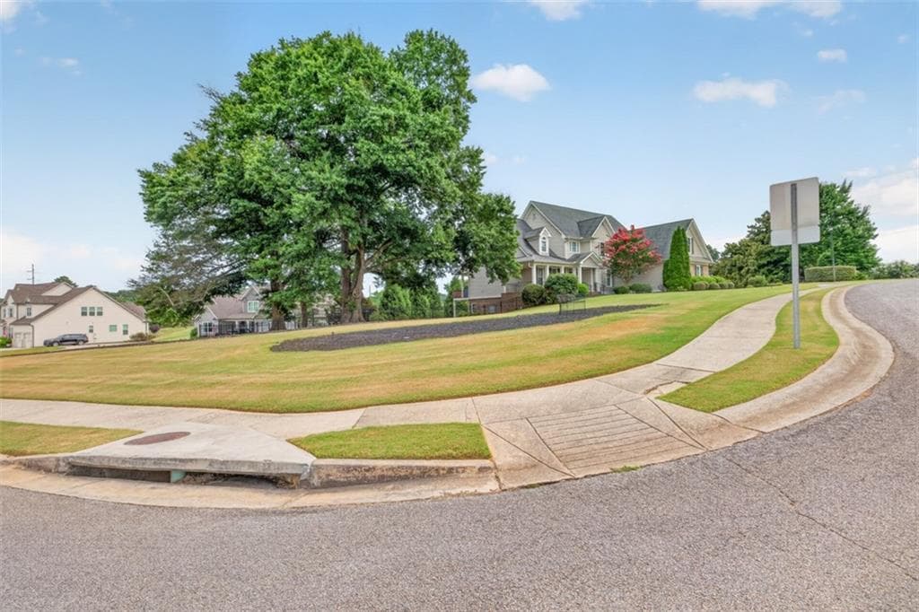 4 bedroom, 4 bathroom, 6,425 sq ft single family residence for sale at 5704 Avalon Commons Way, Clermont, GA 30527 — photo 10