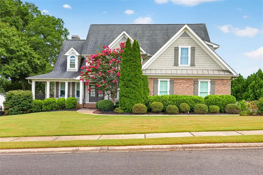 4 bedroom, 4 bathroom, 6,425 sq ft single family residence for sale at 5704 Avalon Commons Way, Clermont, GA 30527 — photo 2