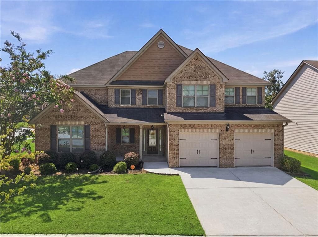 5 bedroom, 6 bathroom, 3,882 sq ft single family residence for sale at 681 Langley Farms Drive, Loganville, GA 30052 — photo 1 of 75