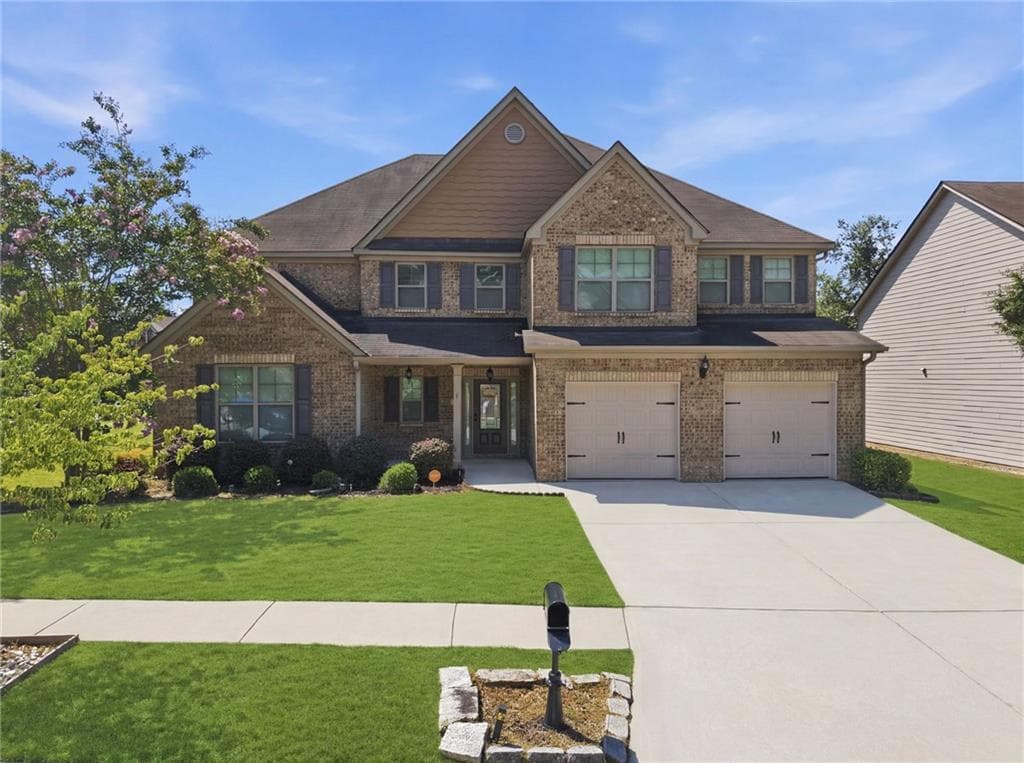 5 bedroom, 6 bathroom, 3,882 sq ft single family residence for sale at 681 Langley Farms Drive, Loganville, GA 30052 — photo 2