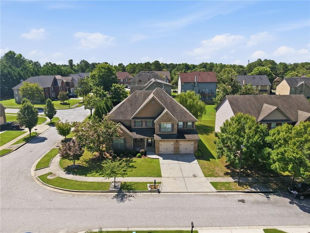 5 bedroom, 6 bathroom, 3,882 sq ft single family residence for sale at 681 Langley Farms Drive, Loganville, GA 30052 — photo 3