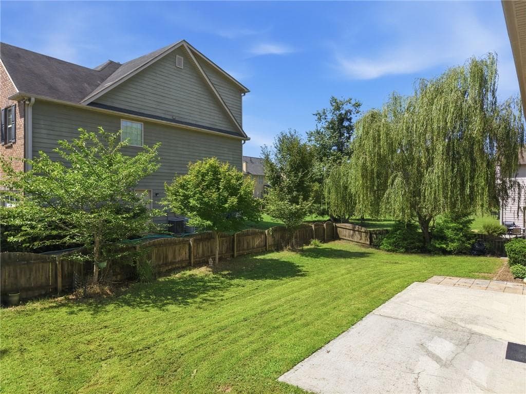 5 bedroom, 6 bathroom, 3,882 sq ft single family residence for sale at 681 Langley Farms Drive, Loganville, GA 30052 — photo 9