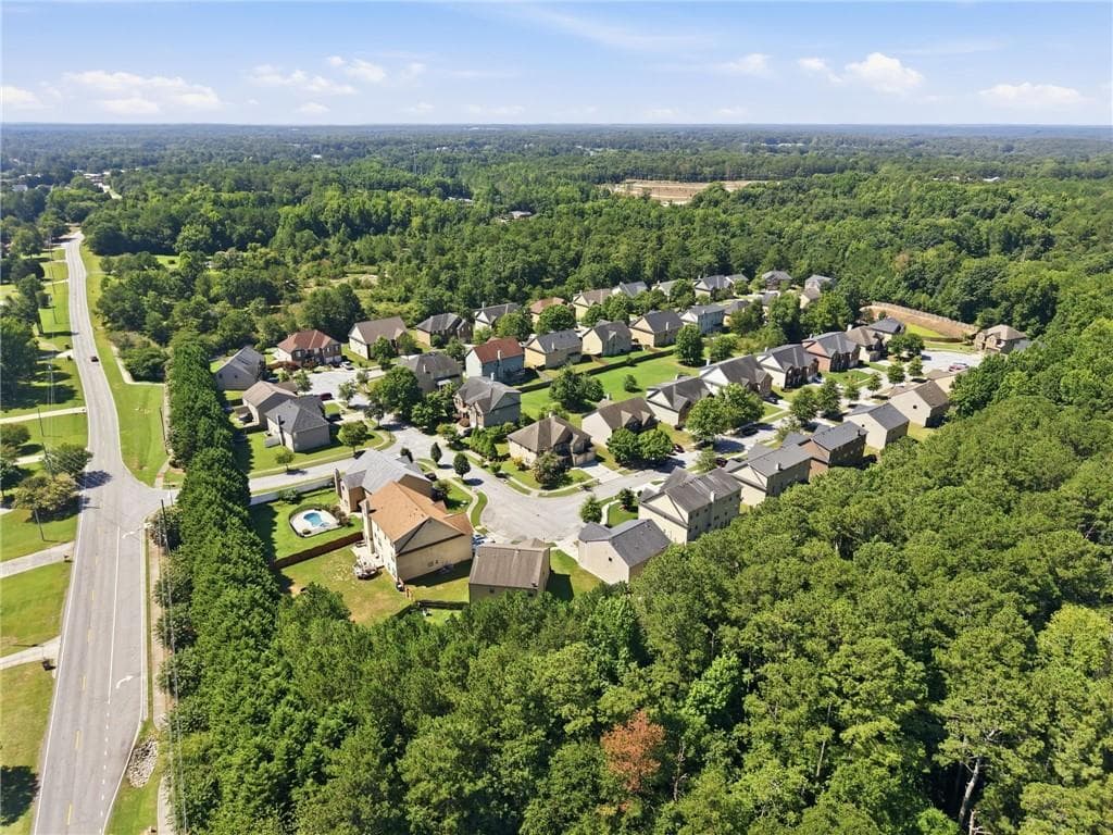 5 bedroom, 6 bathroom, 3,882 sq ft single family residence for sale at 681 Langley Farms Drive, Loganville, GA 30052 — photo 10