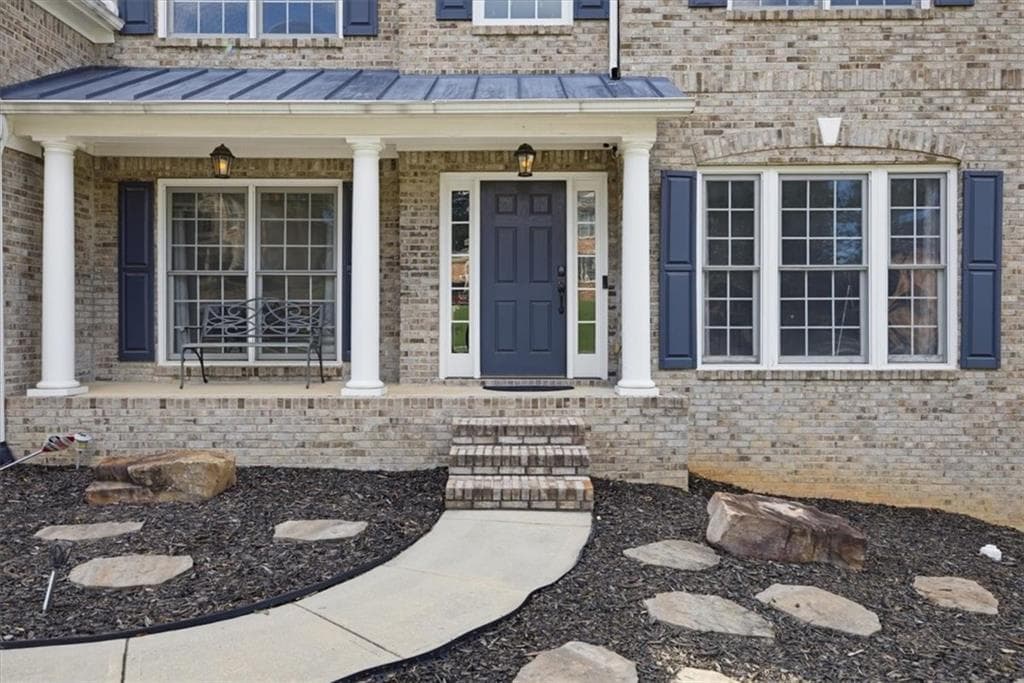 5 bedroom, 4 bathroom, 4,053 sq ft single family residence for sale at 1841 River Crest Way, Lawrenceville, GA 30045 — photo 4