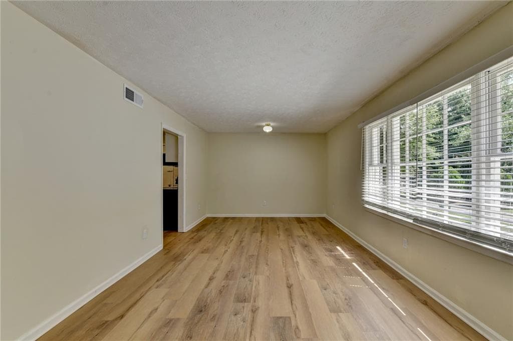 5 bedroom, 3 bathroom, 2,600 sq ft single family residence for sale at 298 W Wind Drive, Lilburn, GA 30047 — photo 3