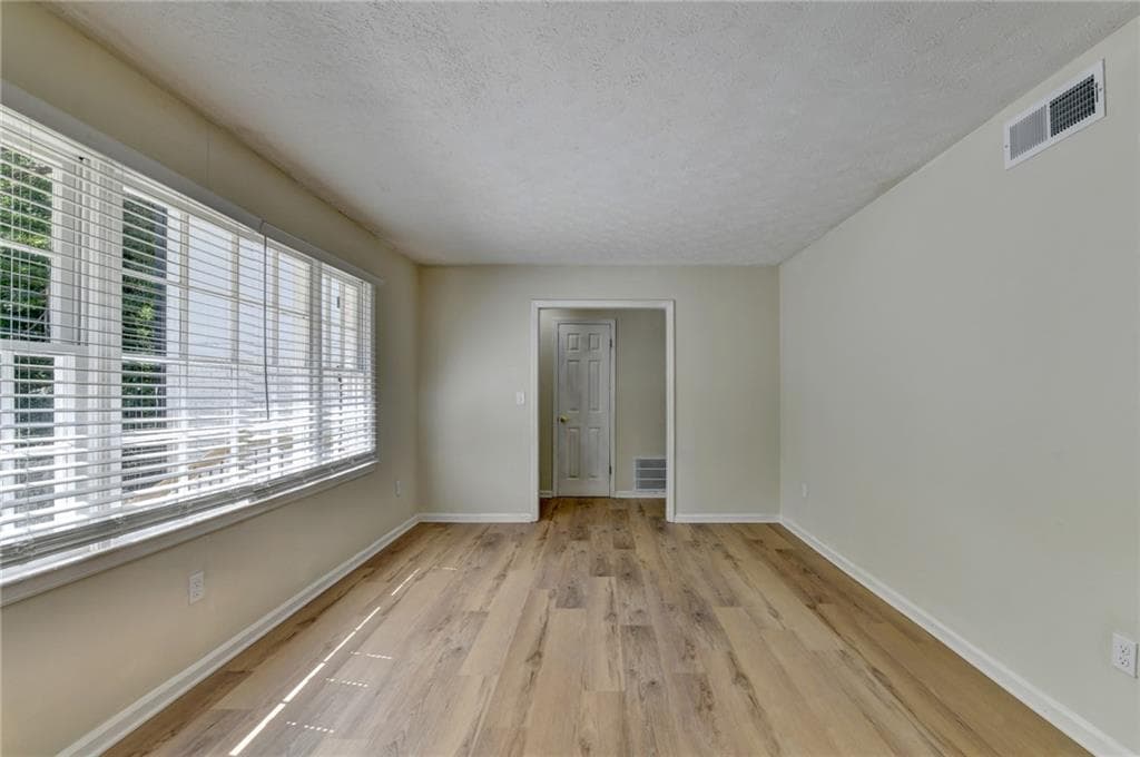 5 bedroom, 3 bathroom, 2,600 sq ft single family residence for sale at 298 W Wind Drive, Lilburn, GA 30047 — photo 6