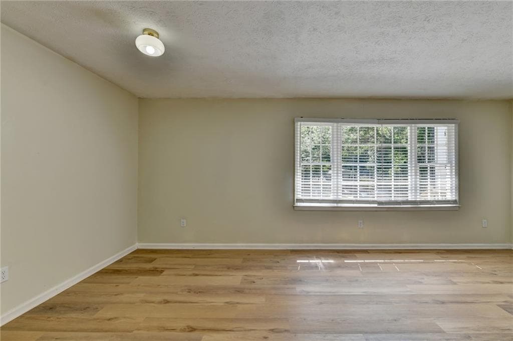 5 bedroom, 3 bathroom, 2,600 sq ft single family residence for sale at 298 W Wind Drive, Lilburn, GA 30047 — photo 7