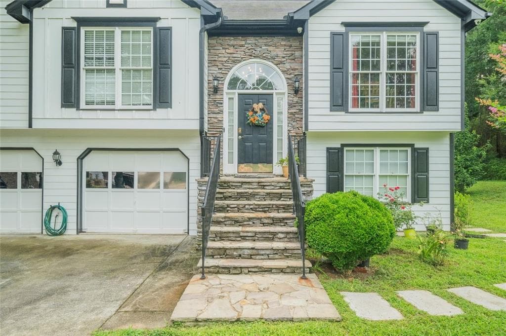 5 bedroom, 3 bathroom, 2,179 sq ft single family residence for sale at 1605 Watson Ridge Trail, Lawrenceville, GA 30045 — photo 3