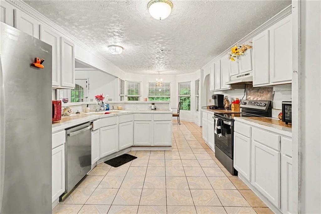 4 bedroom, 3 bathroom, 2,649 sq ft single family residence for sale at 5667 Miller Grove Road, Lithonia, GA 30058 — photo 8