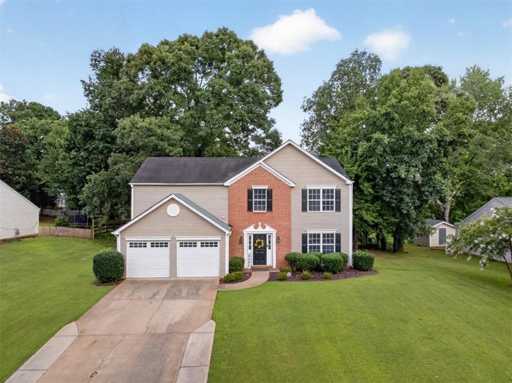 4 bedroom, 3 bathroom, 2,152 sq ft single family residence for sale at 4110 Ridgebrook Bend, Cumming, GA 30028 — photo 2