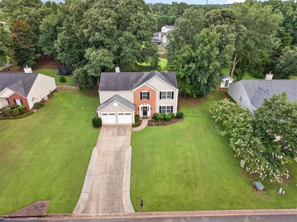 4 bedroom, 3 bathroom, 2,152 sq ft single family residence for sale at 4110 Ridgebrook Bend, Cumming, GA 30028 — photo 3