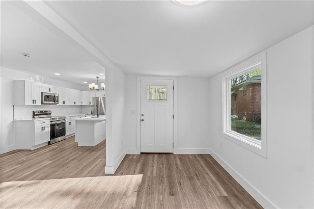 3 bedroom, 2 bathroom, 1,128 sq ft single family residence for sale at 2466 SW Old Hapeville Road, Atlanta, GA 30315 — photo 5