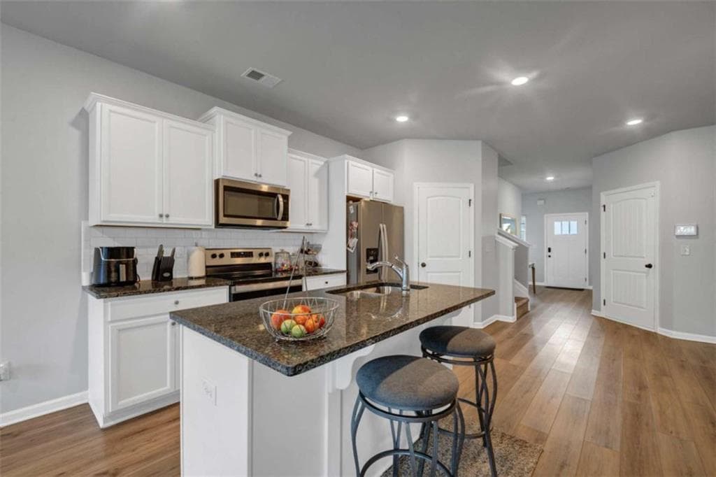 4 bedroom, 3 bathroom, 2,560 sq ft single family residence for sale at 11655 Stovall Place, Hampton, GA 30228 — photo 7