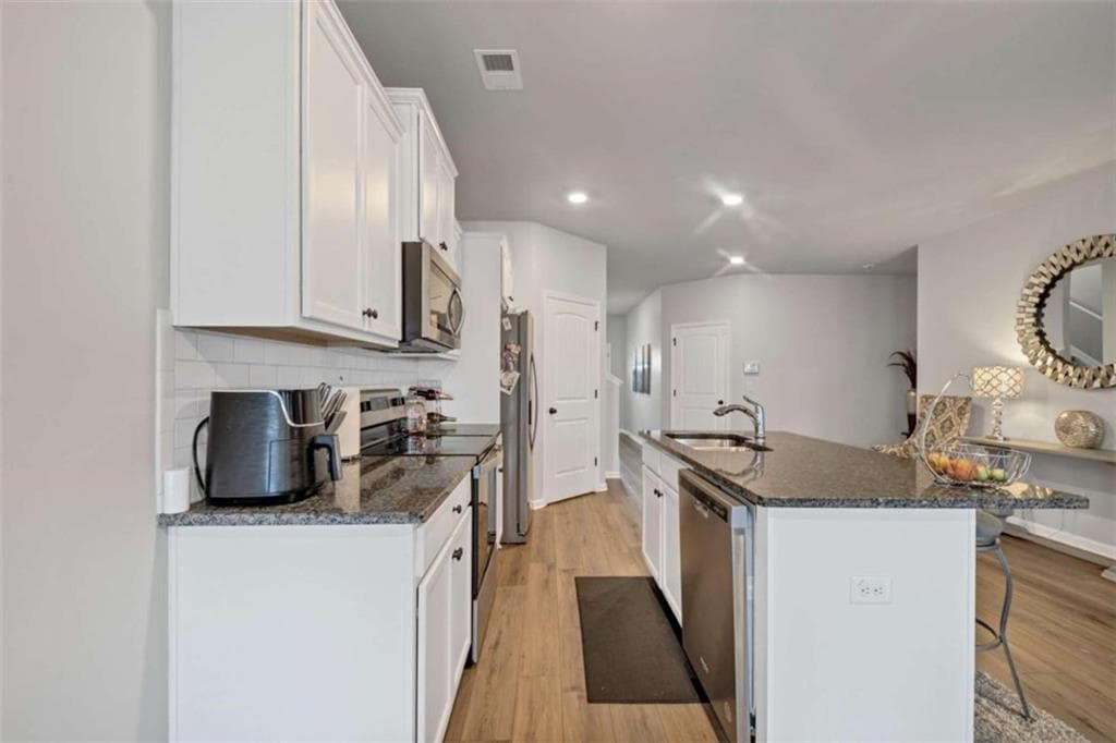 4 bedroom, 3 bathroom, 2,560 sq ft single family residence for sale at 11655 Stovall Place, Hampton, GA 30228 — photo 8
