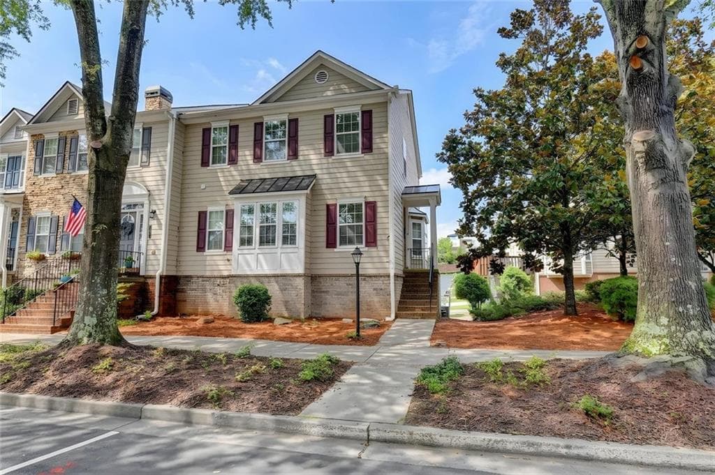 3 bedroom, 3 bathroom, 2,220 sq ft townhouse for sale at 3761 Lake Point Boulevard, Suwanee, GA 30024