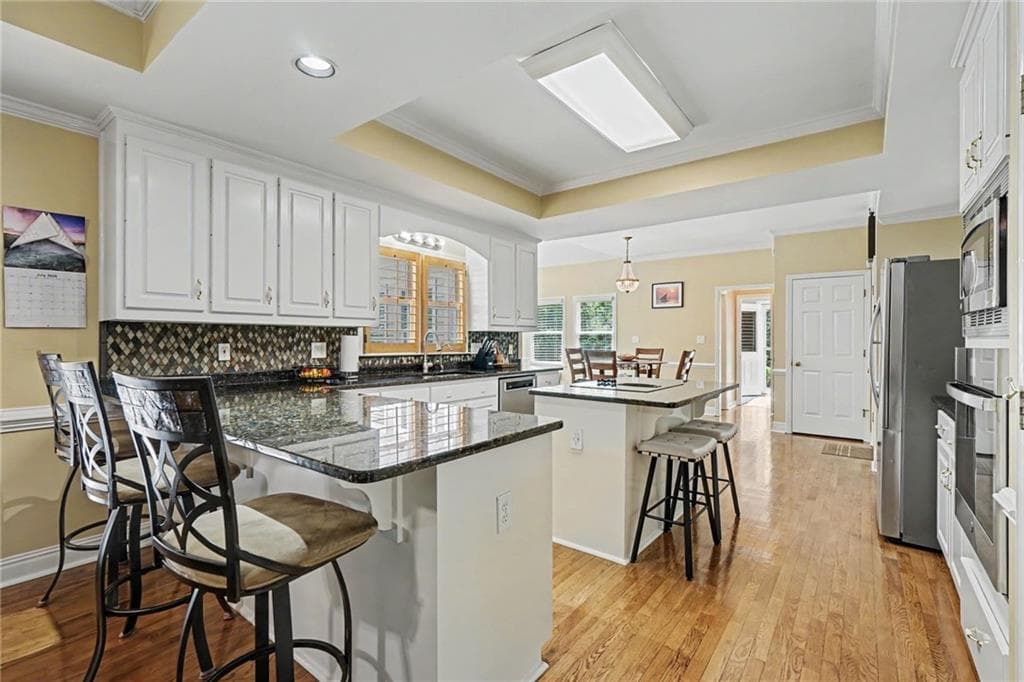 5 bedroom, 5 bathroom, 4,206 sq ft single family residence for sale at 4299 Donerail Drive, Snellville, GA 30039 — photo 9