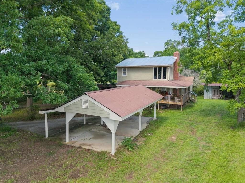 5 bedroom, 3 bathroom, 1,992 sq ft single family residence for sale at 929 Nicholsville Road, Monroe, GA 30656 — photo 2