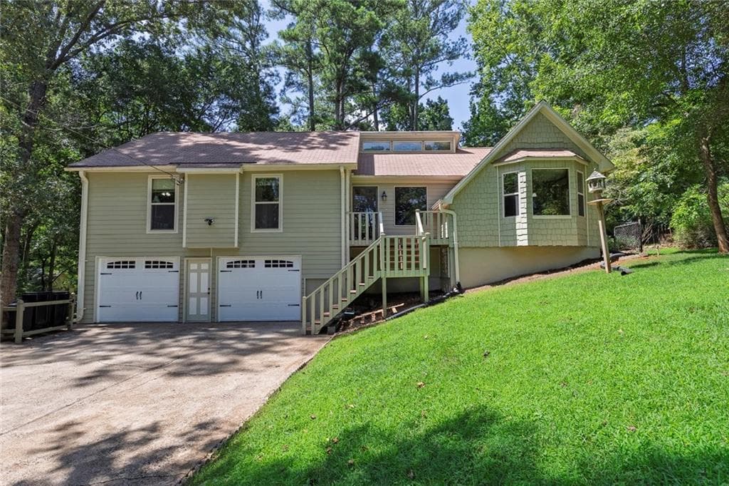 3 bedroom, 2 bathroom, 1,636 sq ft single family residence for sale at 709 Cobb Trail, Woodstock, GA 30188 — photo 1 of 49