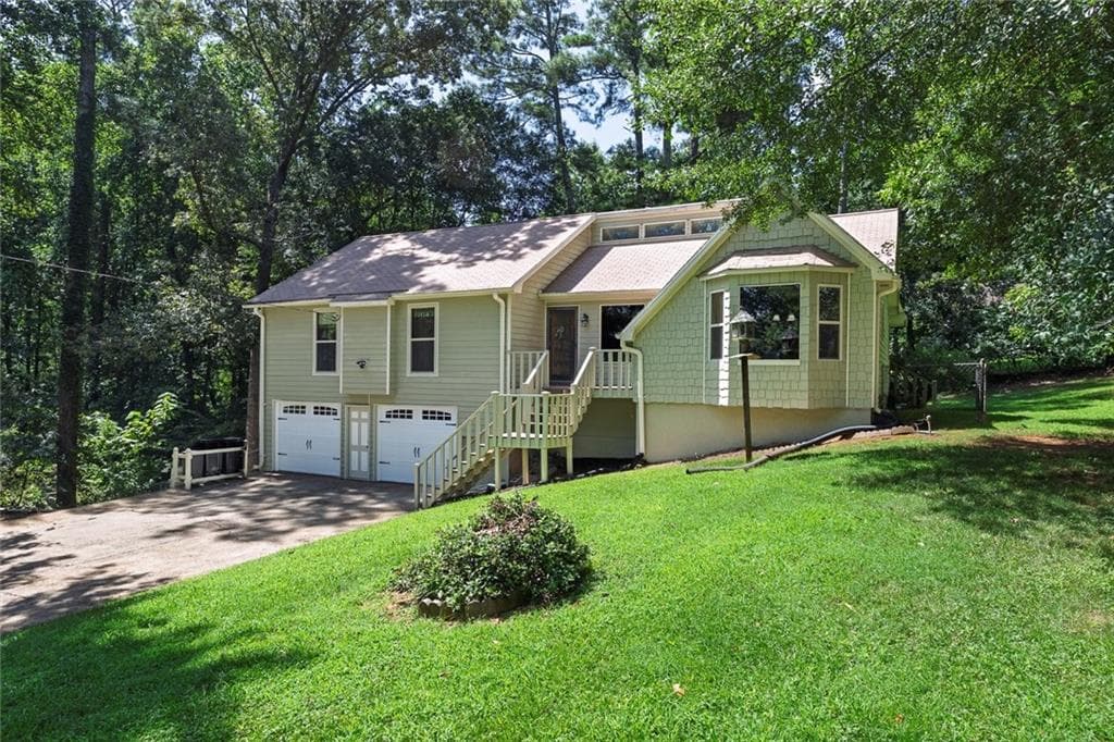 3 bedroom, 2 bathroom, 1,636 sq ft single family residence for sale at 709 Cobb Trail, Woodstock, GA 30188 — photo 2