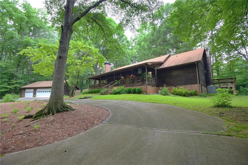4 bedroom, 3 bathroom, 3,216 sq ft single family residence for sale at 496 Carlouetta Road, Mableton, GA 30126